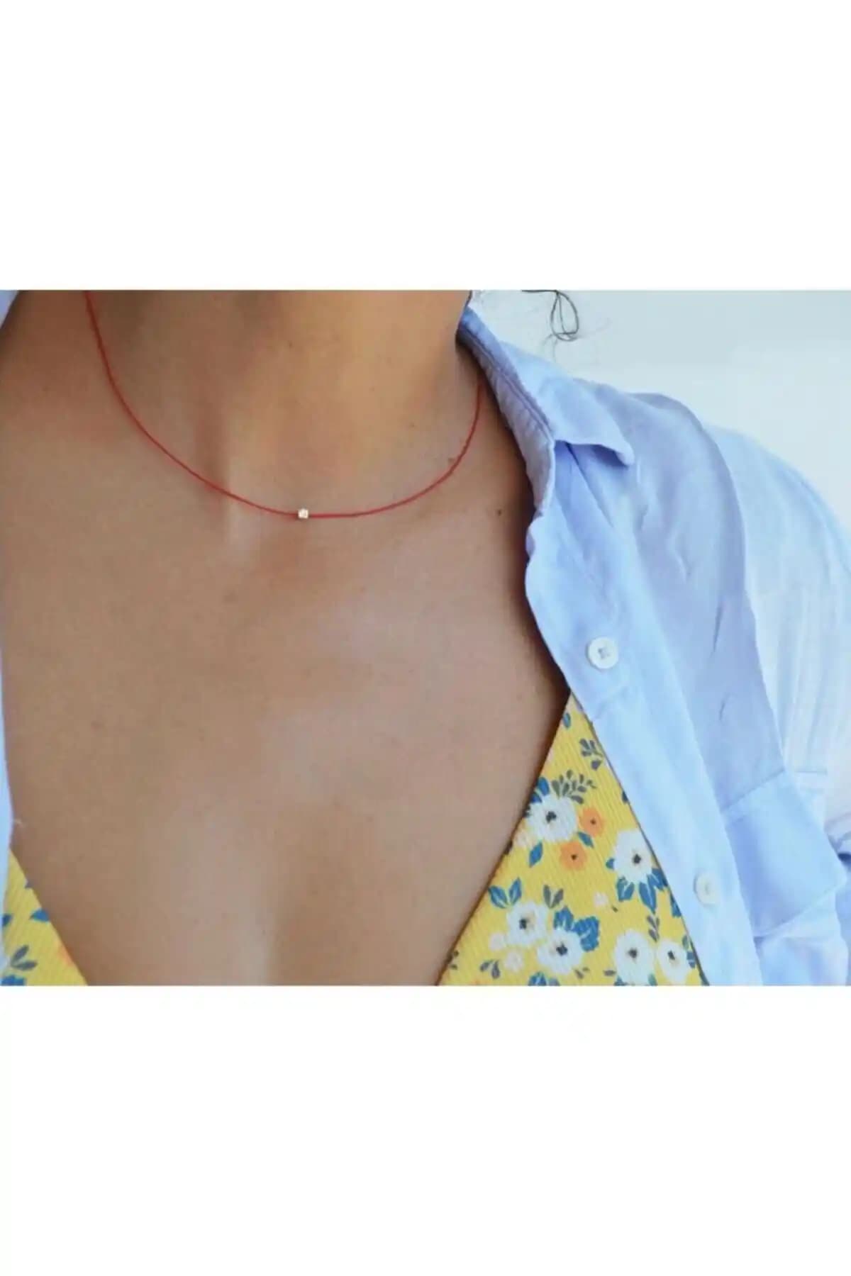 Kırmızı İp Çelik Boncuk Kolye: Sembolik Anlam ve Estetiğin Buluşması