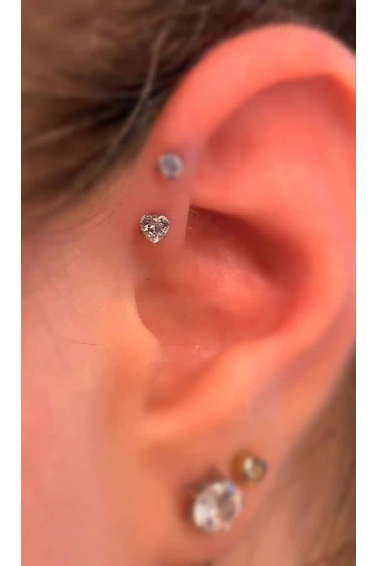Arescollection Tek Taş Piercing Karşılaştırması: Kalp ve Yıldız Tasarımları Analizi