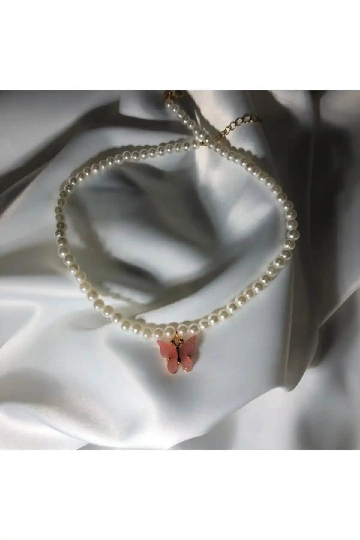 Claritas Takı ve EST Aksesuar Kelebek Kolye Karşılaştırması