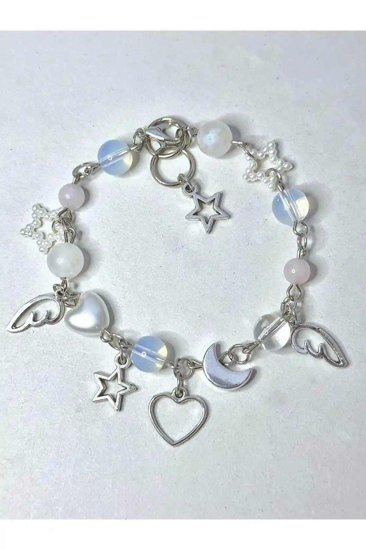 Pembe Kuvars Aytaşı Opal Bileklik: Doğal Taşların Zarif ve Enerjik Tasarımı