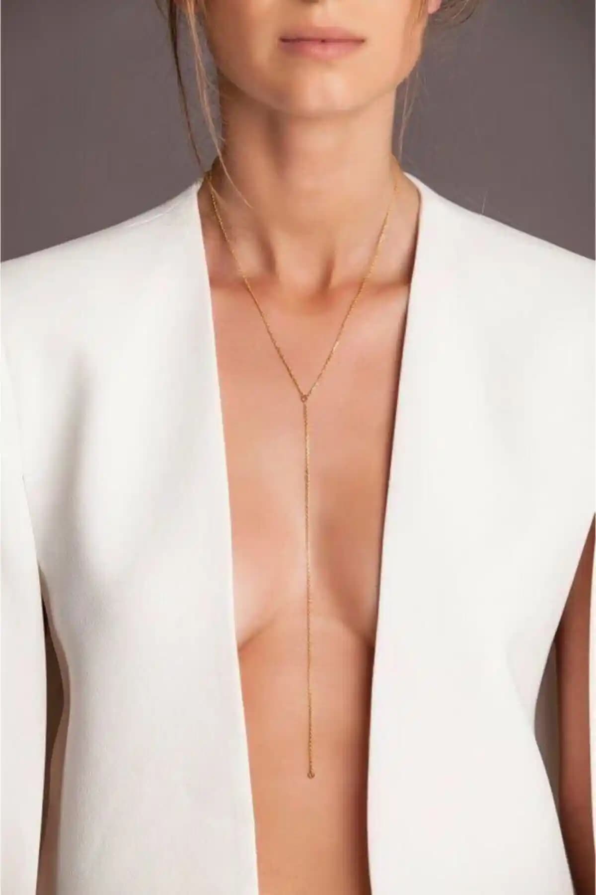 Ryden Altın Rengi Uzun Zincir Kolye: Şıklık ve Zarafetin Modern Temsilcisi