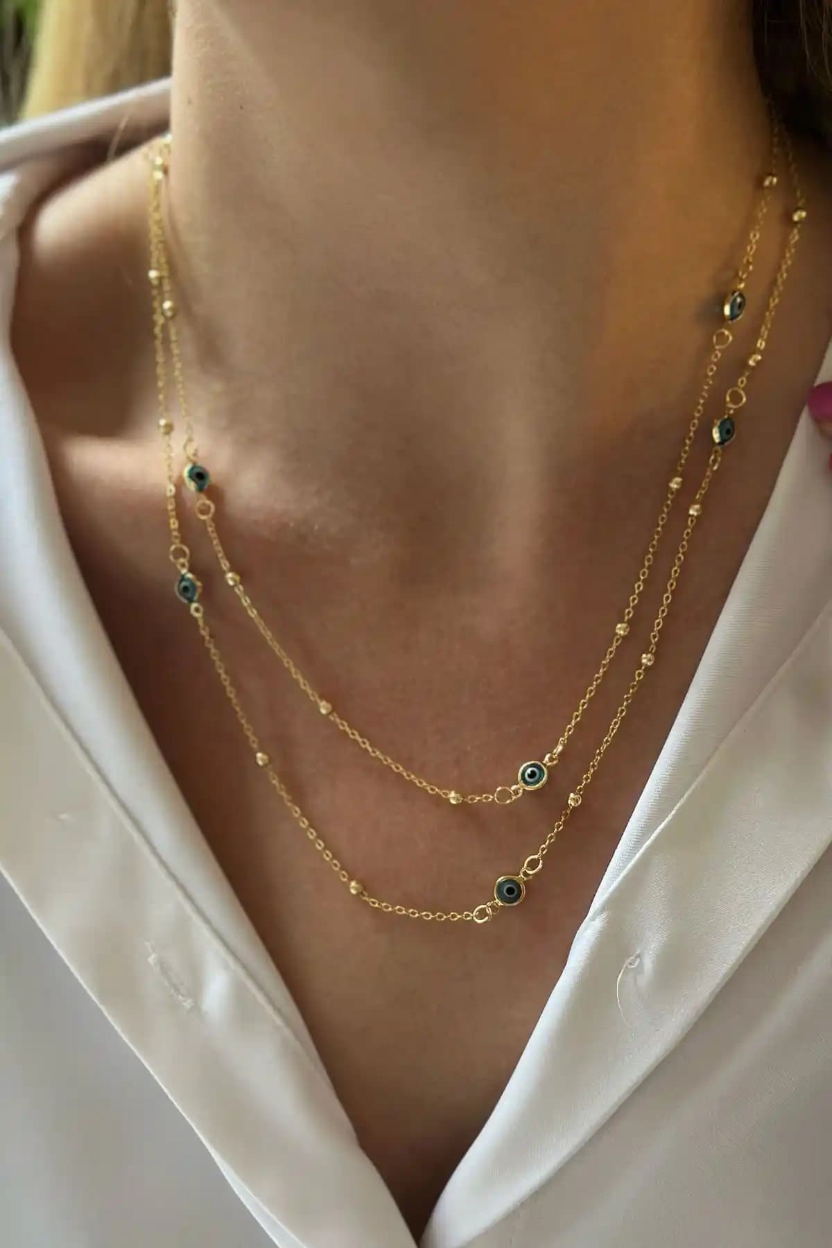 Trendy Butik Dolamalı Nazar Kolye: Estetik ve Koruyucu Şıklık İçin Uygun Bir Seçenek