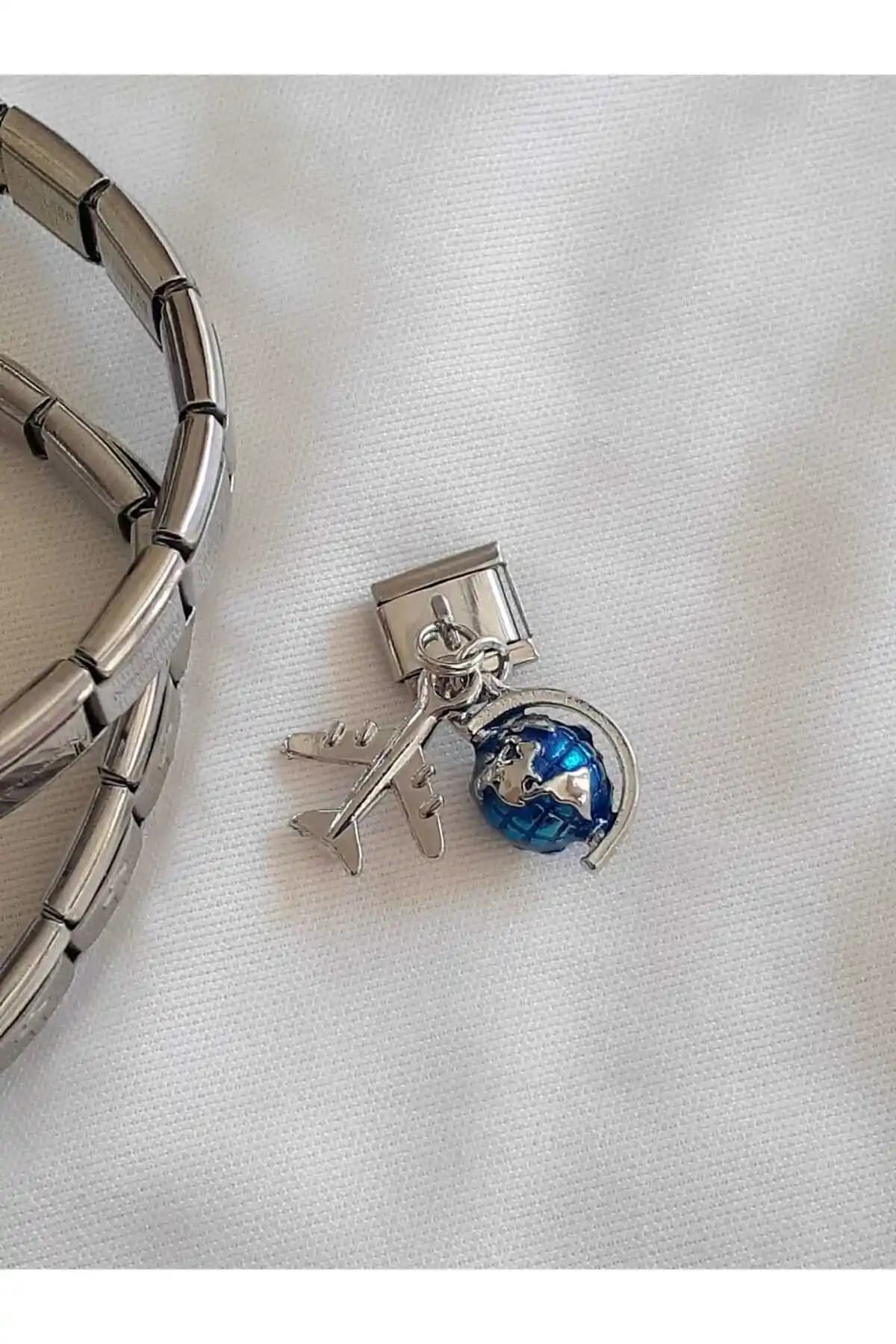 Çelik Italyan Charm: Seyahat Tutkunları İçin Dayanıklı ve Şık Tasarım Ürünü