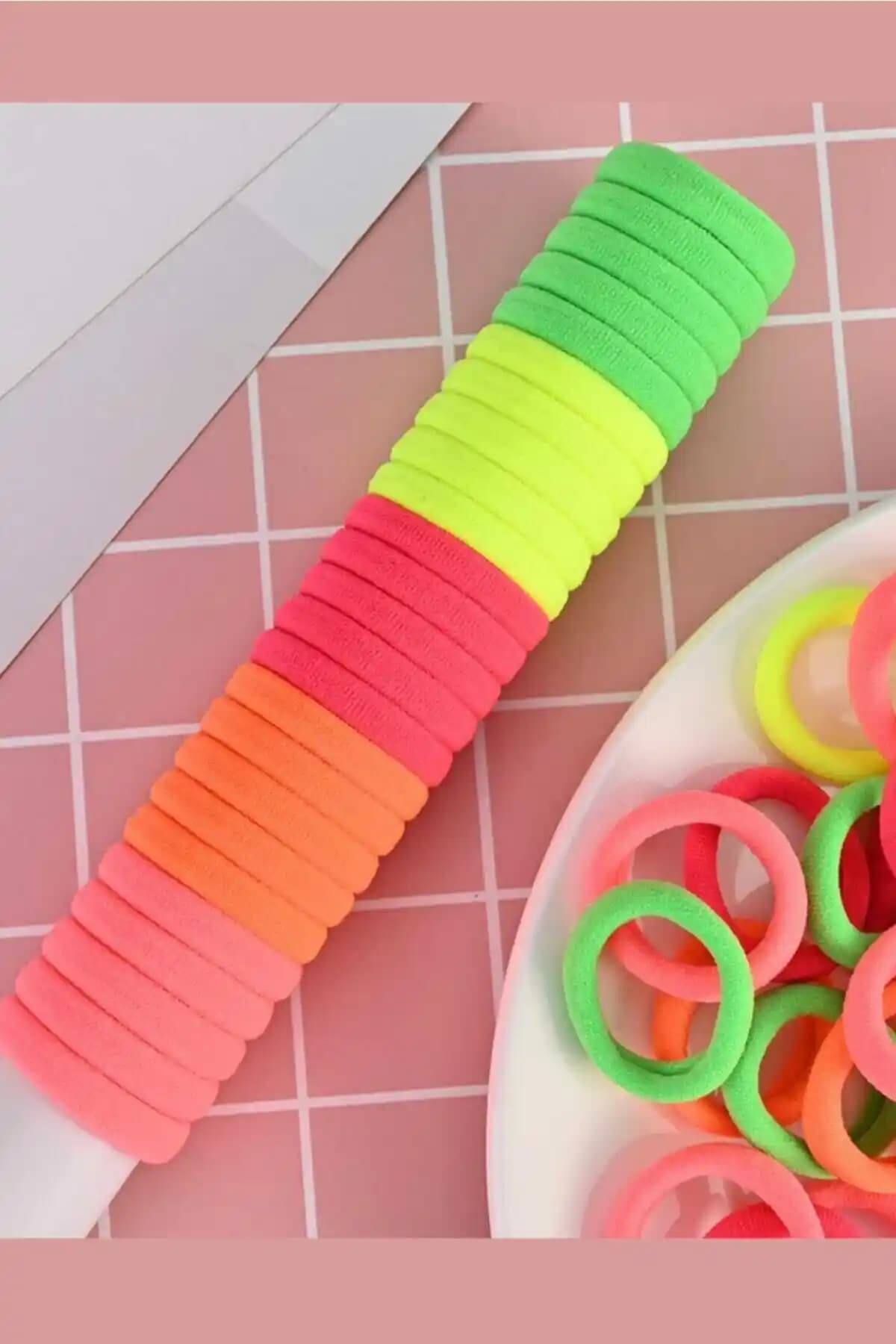 Kadın 50'li Renkli Lastik Toka Setleri Karşılaştırması: Özellikler ve Kullanıcı Yorumları