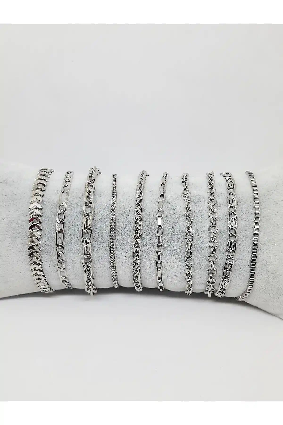 Kusaklı 10'lu Gümüş Renk Zincir Bileklik Seti Zarafetin ve Dayanıklılığın Temsilcisi