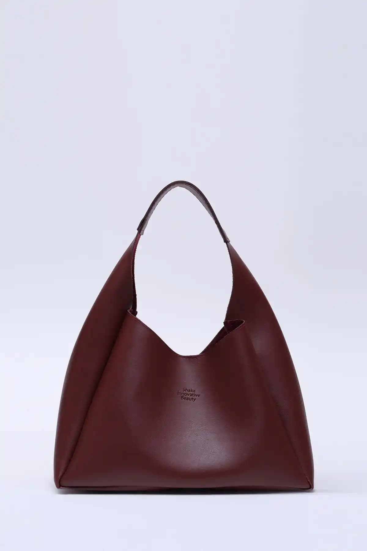 Shaka Bordo ve Shaka Saks Mavi Çanta Modellerinin Detaylı Karşılaştırması