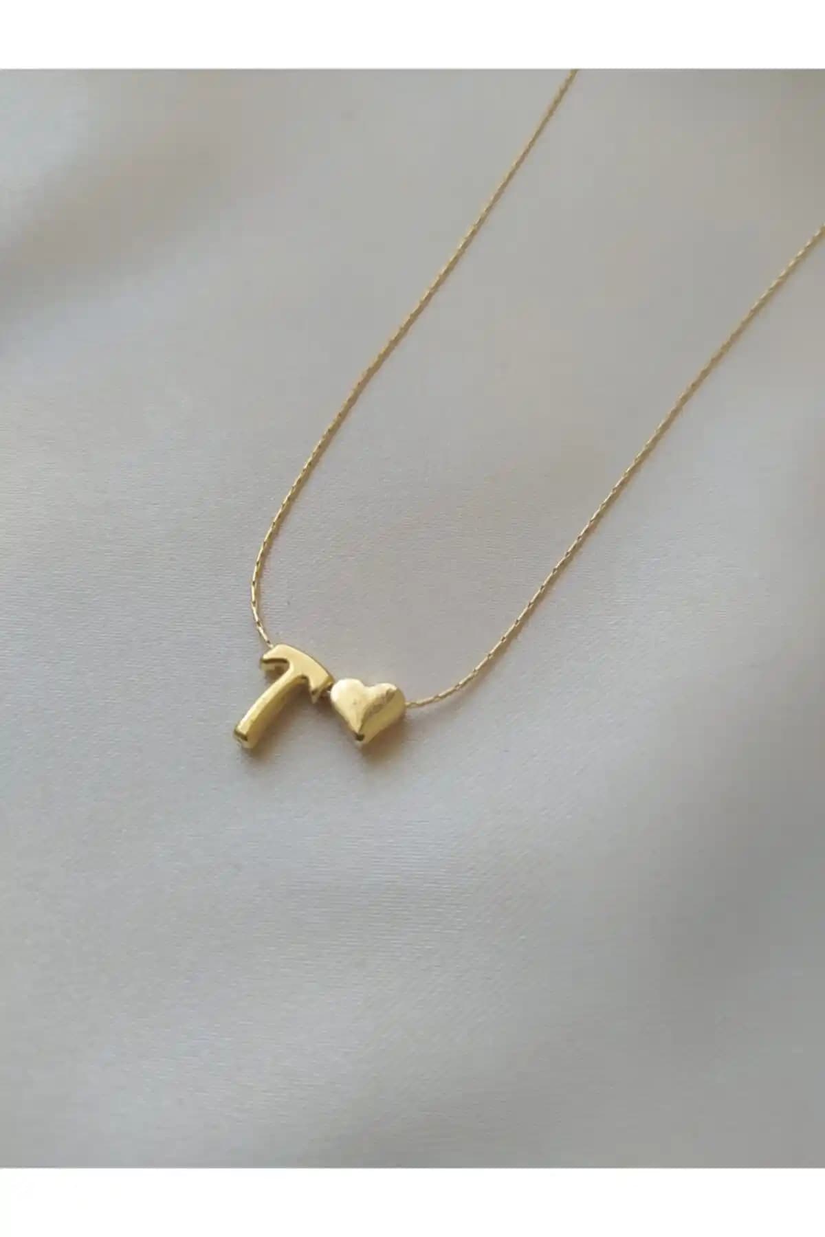 Asia Chic T Harfli ve Bilsen Store 925 Ayar Gümüş Kolye Karşılaştırması