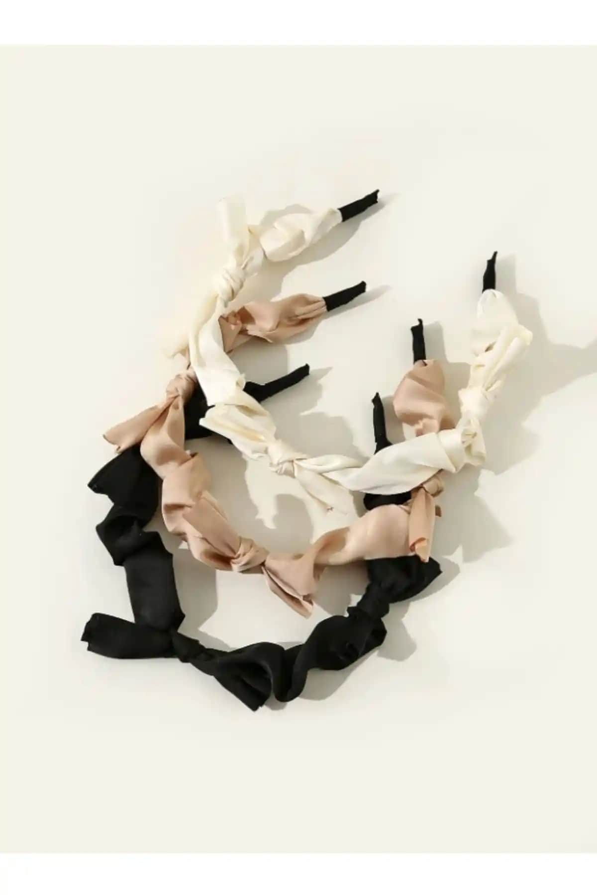 CSR Aksesuar 3'lü Fiyonk Düğüm ve 4'lü Klasik Ka<dı>n Taç Setleri Karşılaştırması