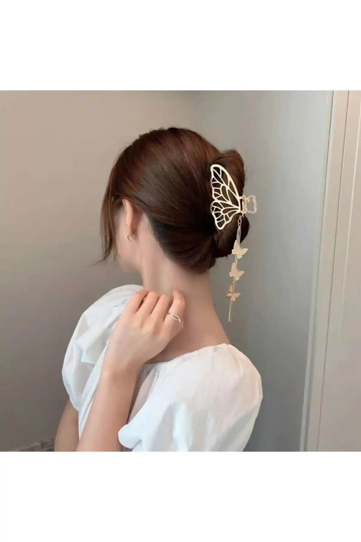 Gülpeşe Kelebek Sallantı Tokası: Altın Renk ve Animal Desen Detaylarıyla Şıklık