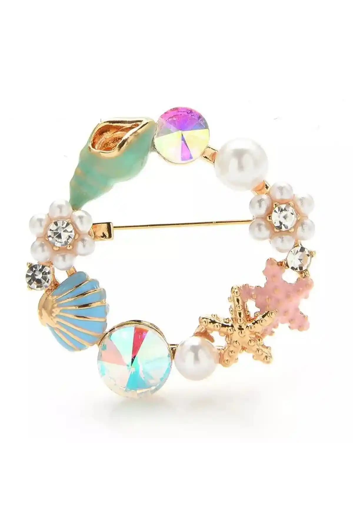 Pelin Aksesuar Mavi Deniz Kabuğu ve Melek Kız Broş Karşılaştırması